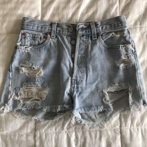 Levi’s Light wash distressed cut off denim shorts